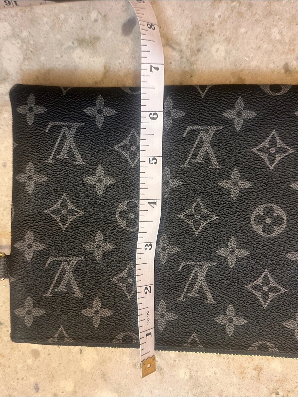 Unlisted sleek wristlet